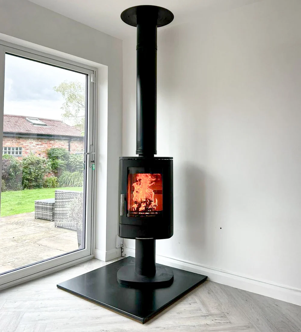 Wood burning stove installation in London